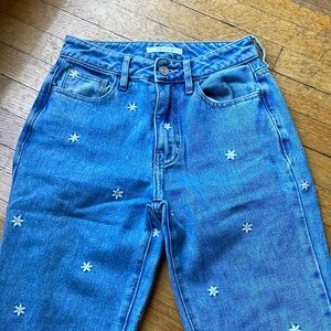 Pac Sun Mom Jeans with embroidered daisy.